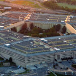US pentagon building aerial view at sunset